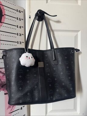 MCM Black Monogram Leather Tote with White Plush Charm